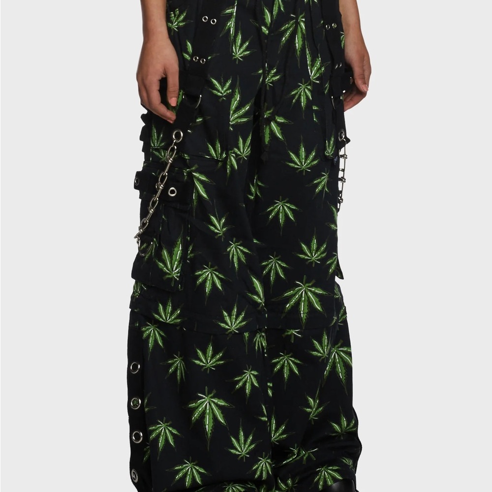 Unisex Tripp NYC Jungleland cargo pants with Green Leaf Print and Chain Detail